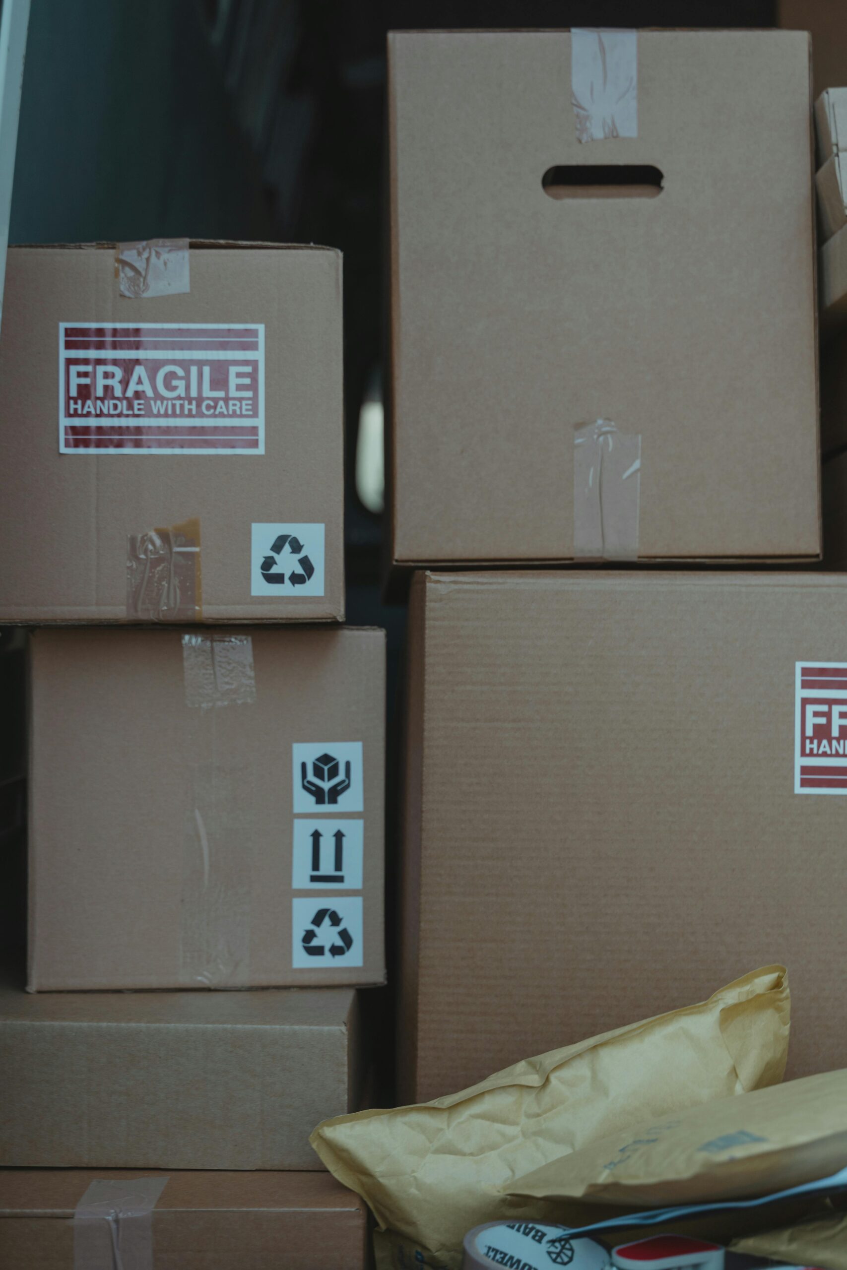 Close-up Photo of Stacked Carton Boxes